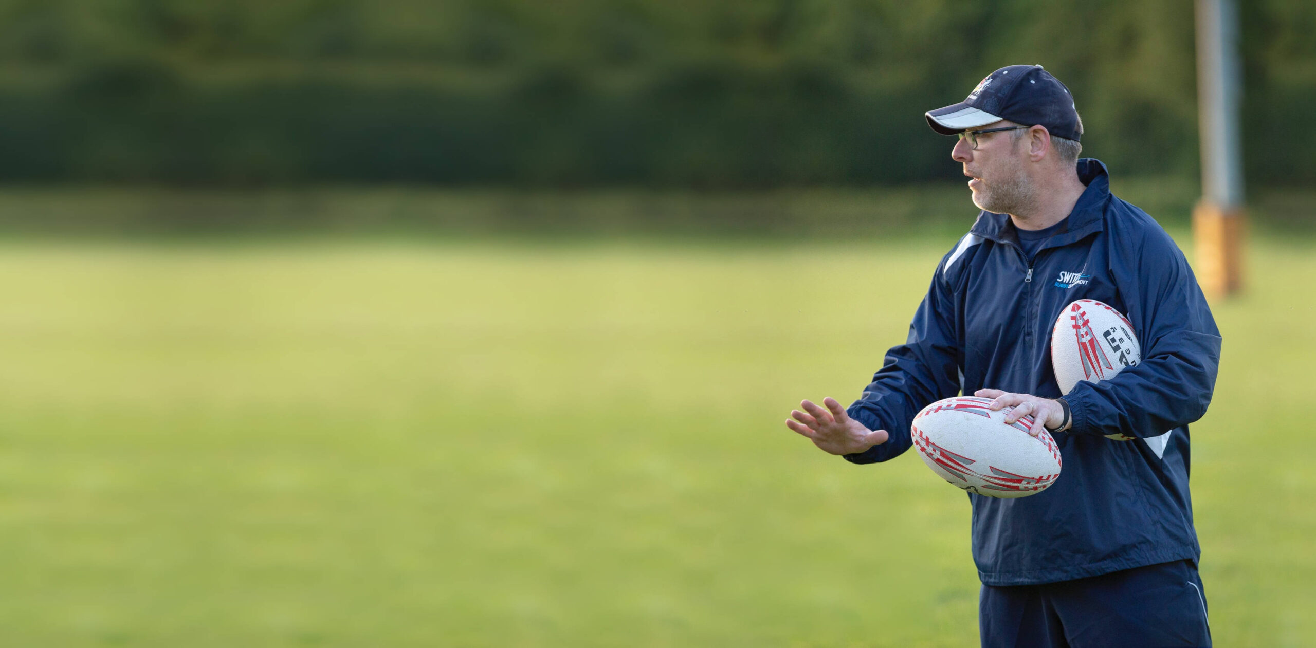 A wide angled shot of Switch Rugby Director and Coach Matthew Sheppard in action