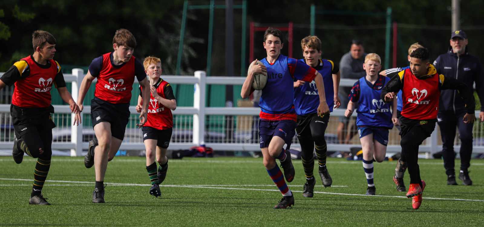 Young rugby players in action during a Switch Rugby session being coached by director and head coach Matt Sheppard