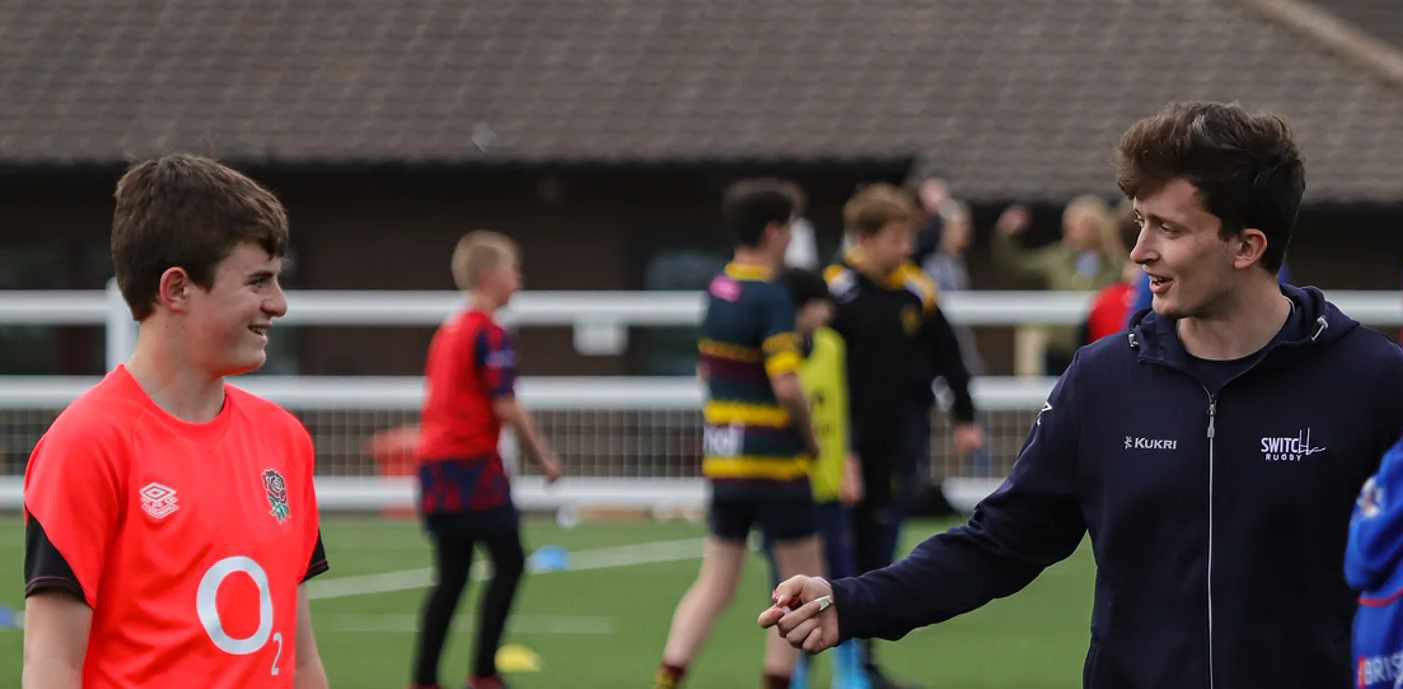 RFU qualified Switch Rugby coach Lawrence Gill in action teaching some young players in a small group session