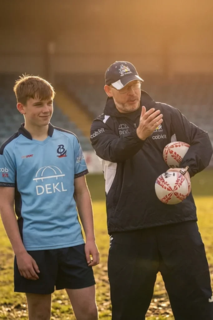 City of Bristol Rugby U16 head coach delivering technical instruction during elite youth rugby training session in Bristol