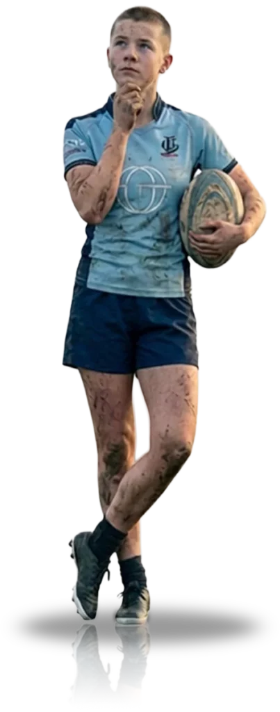 Thoughtful City of Bristol Rugby U16 player holding rugby ball and reflecting – perfect for FAQs on the development programme and representing Bristol